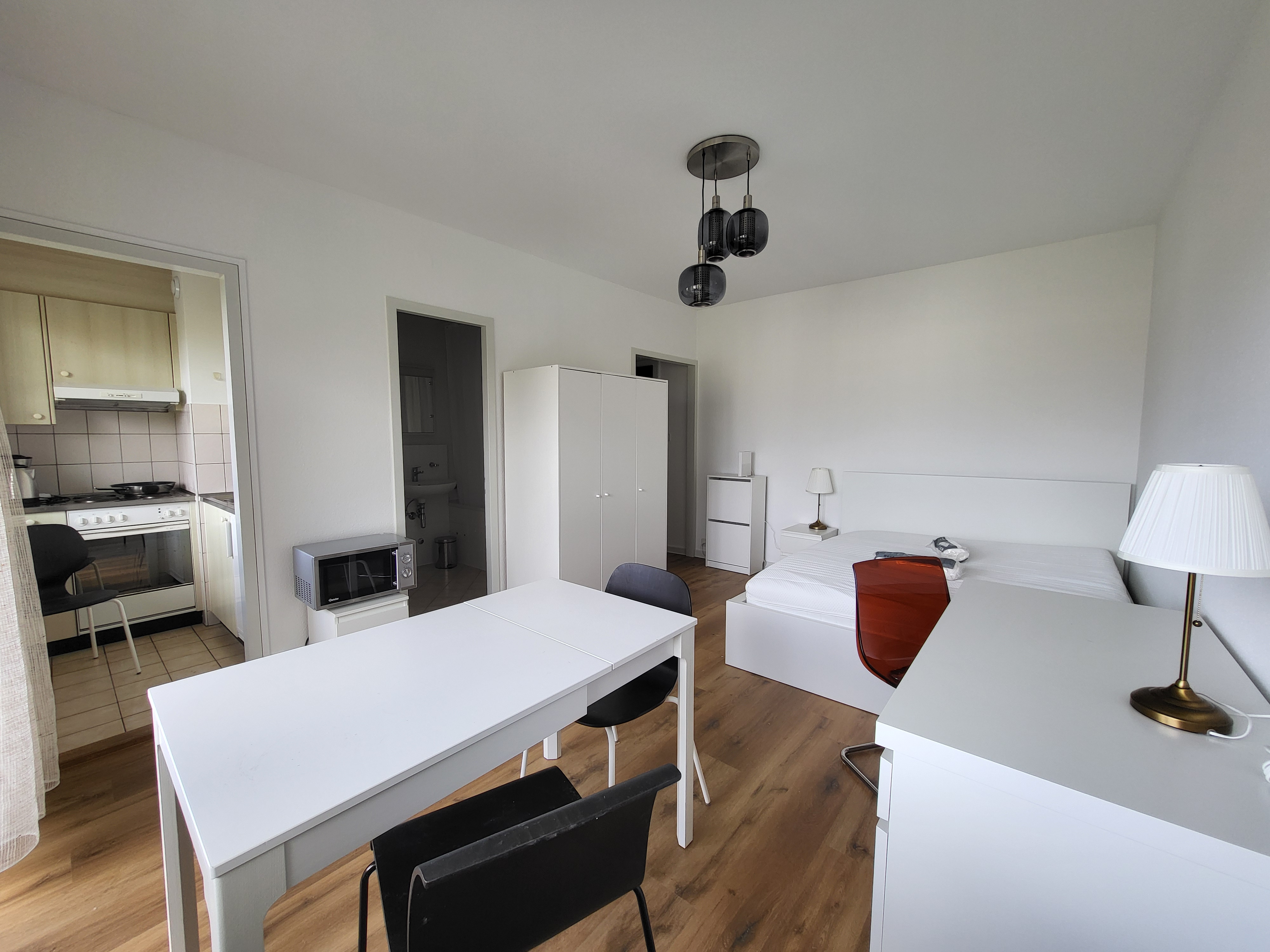 Image of the apartment's living room, with its new cosy furniture