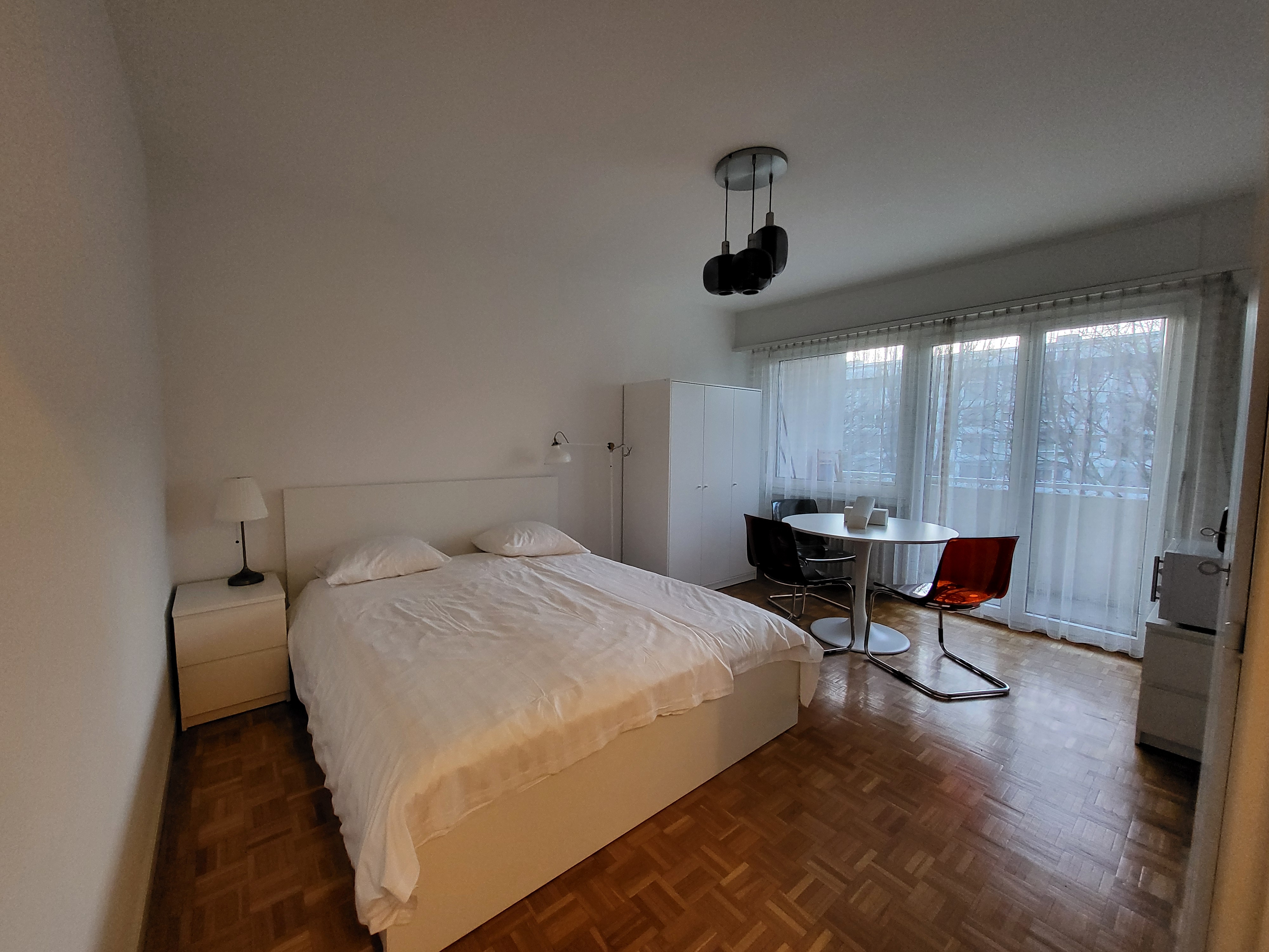 Image of the apartment's bedroom, with its new cosy furniture